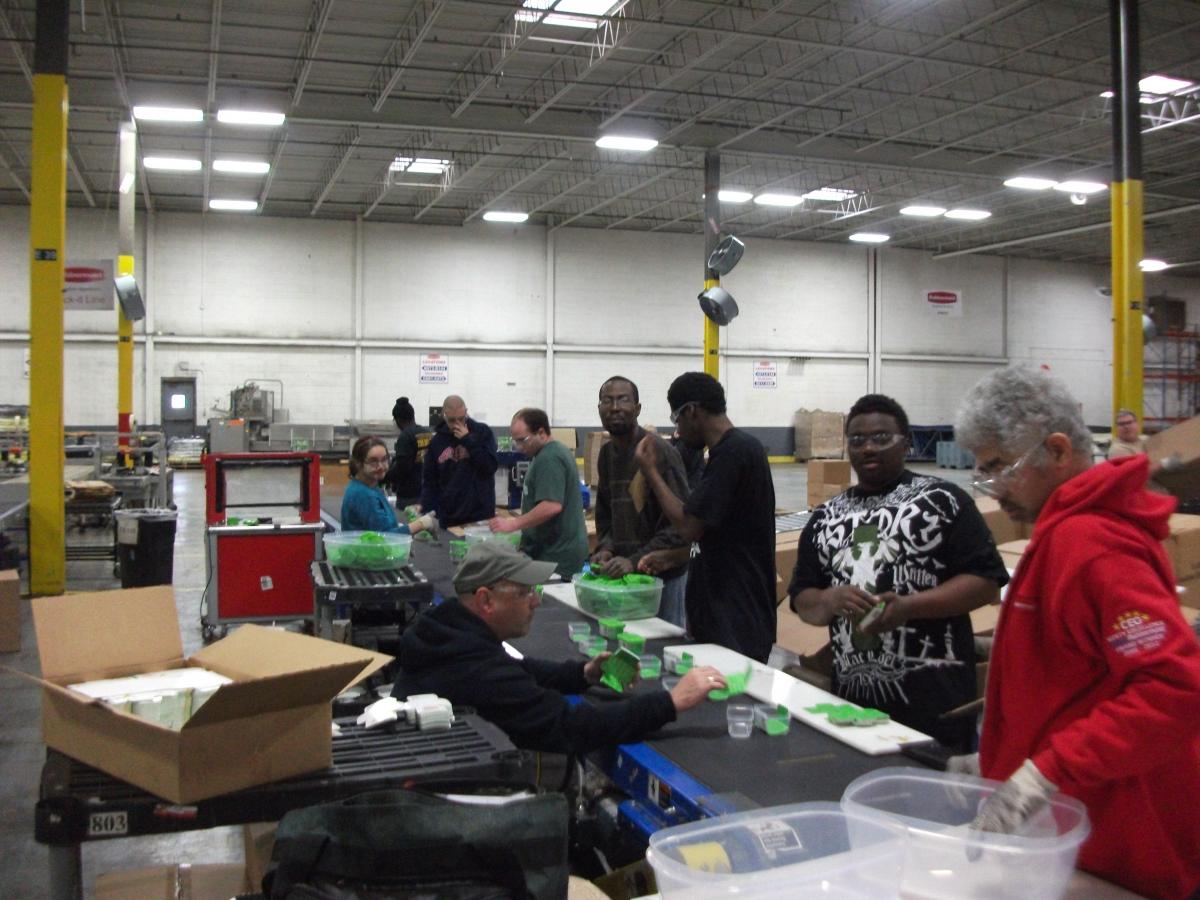 Picture of individuals working at Rubbermaid in 2014.